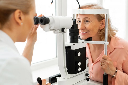 Doctor Eye Testing With Ophthalmic Equipment